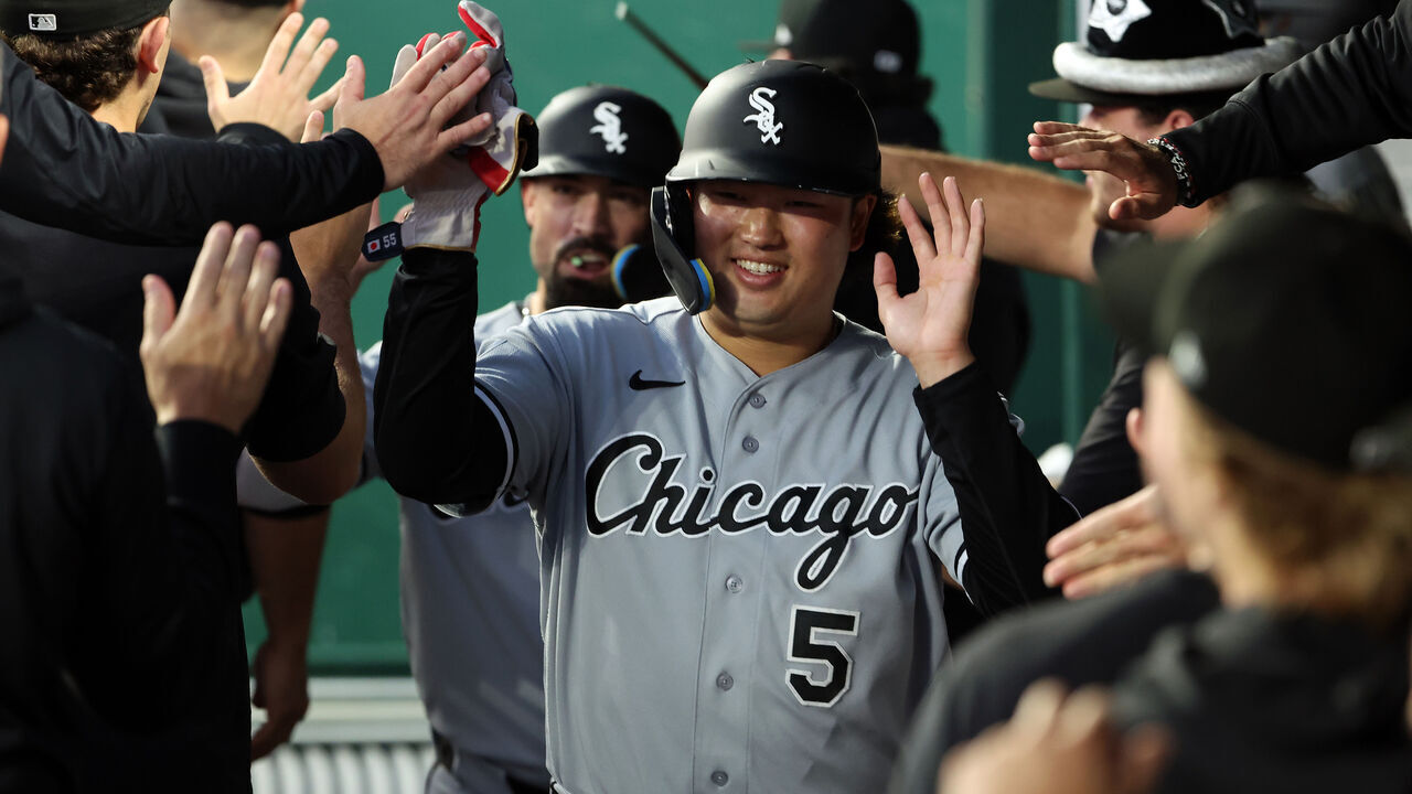 KANSAS CITY, MISSOURI - SEPTEMBER 22: First baseman Munetaka Murakami #5 of the Chicago White Sox is congratulated by teammates in the dugout after scoring on a 3-run home run by second baseman Chase Meidroth #10 during the 3rd inning of the game against the Kansas City Royals at Kauffman Stadium on September 22, 2026 in Kansas City, Missouri.