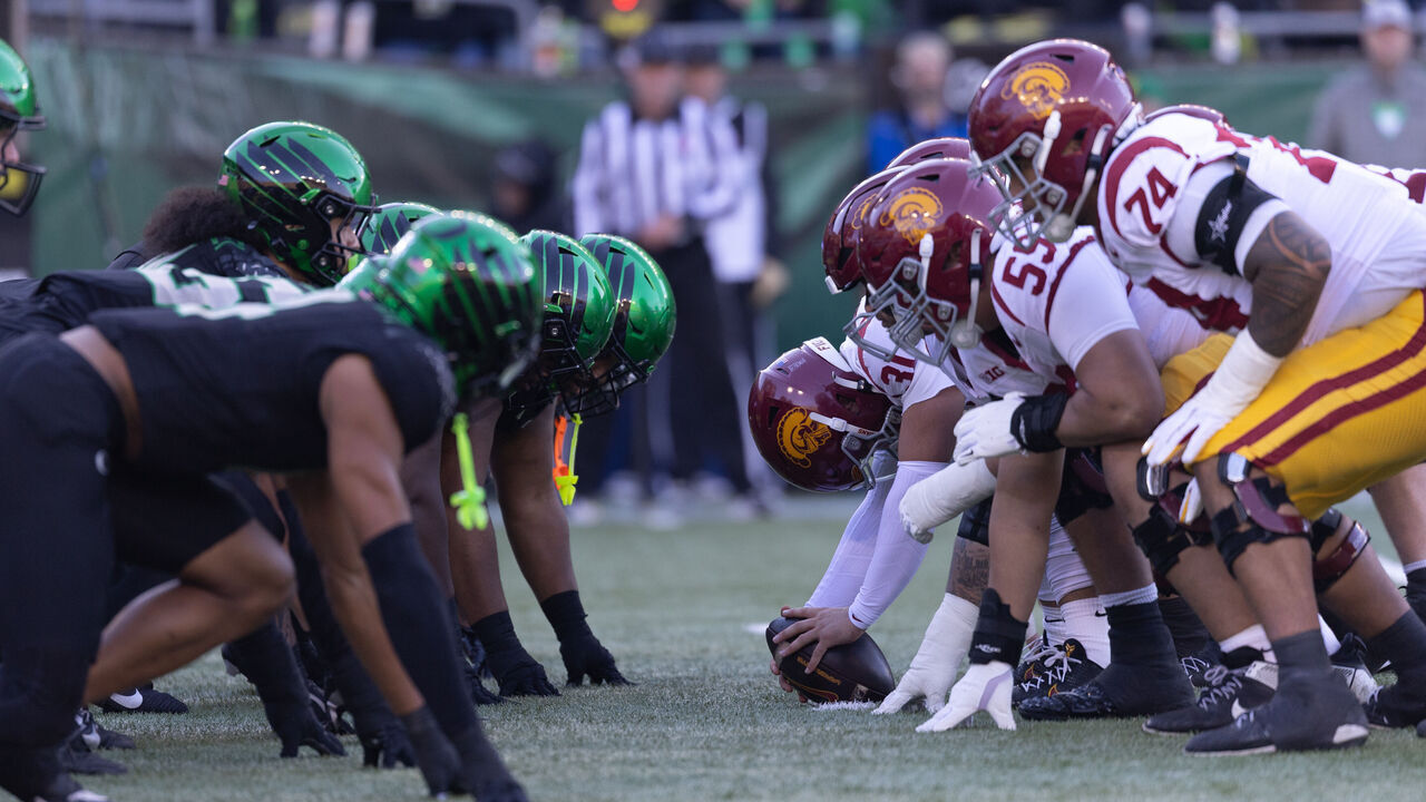 EUGENE, OREGON - NOVEMBER 22: The line of scrimmage between the Oregon Ducks and the Southern California Trojans at Autzen Stadium on November 22, 2025 in Eugene, Oregon.