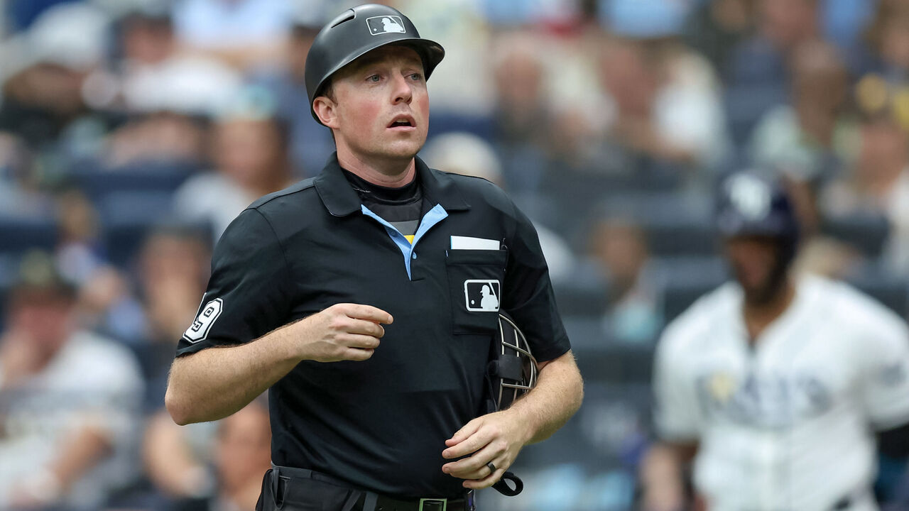 ST. PETERSBURG, FL - AUGUST 30: Umpire Tyler Jones #39 talks to the San Diego Padres against the Tampa Bay Rays during a baseball game at Tropicana Field on August 30, 2026 in St. Petersburg, Florida.