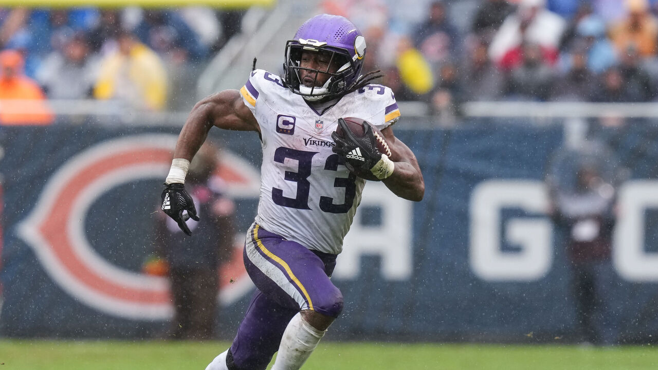 CHICAGO, ILLINOIS - SEPTEMBER 20: Aaron Jones Sr. #33 of the Minnesota Vikings runs with the ball during the fourth quarter of the game against the Pittsburgh Steelers at Soldier Field on September 20, 2026 in Chicago, Illinois.