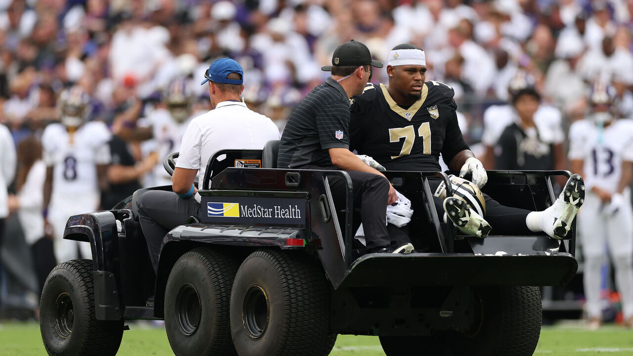 BALTIMORE, MARYLAND - SEPTEMBER 20: Offensive tackle Kelvin Banks Jr. #71 of the New Orleans Saints is carted off of the field injured against the Baltimore Ravens at M&T Bank Stadium on September 20, 2026 in Baltimore, Maryland.
