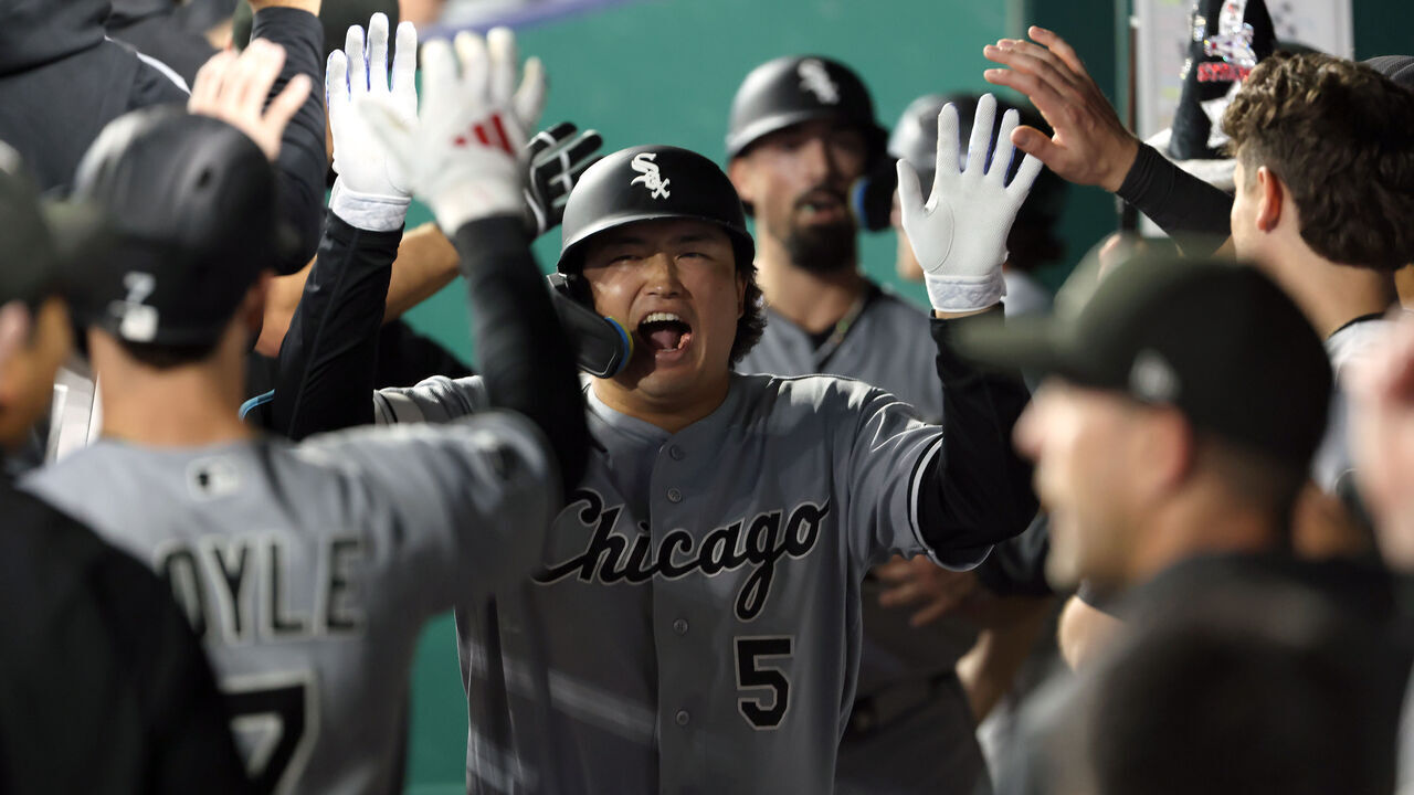 KANSAS CITY, MISSOURI - SEPTEMBER 22: First baseman Munetaka Murakami #5 of the Chicago White Sox is congratulated by teammates in the dugout after hitting a home run during the 7th inning of the game against the Kansas City Royals at Kauffman Stadium on September 22, 2026 in Kansas City, Missouri.