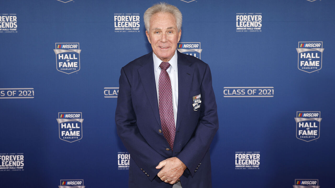 CHARLOTTE, NORTH CAROLINA - JANUARY 21: NASCAR Hall of Famer Darrell Waltrip poses on the red carpet prior to the 2021 NASCAR Hall of Fame Induction Ceremony at NASCAR Hall of Fame on January 21, 2022 in Charlotte, North Carolina.