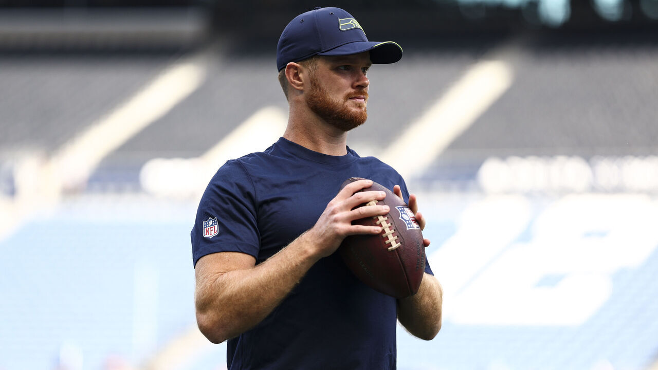 SEATTLE, WASHINGTON - SEPTEMBER 9: Sam Darnold #14 of the Seattle Seahawks warms up prior to an NFL football game against the New England Patriots at Lumen Field on September 9, 2026 in Seattle, Washington.