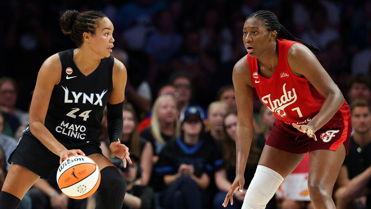 MINNEAPOLIS, MINNESOTA - AUGUST 02: Napheesa Collier #24 of the Minnesota Lynx dribbles the ball against Aliyah Boston #7 of the Indiana Fever in the fourth quarter at Target Center on August 02, 2026 in Minneapolis, Minnesota. The Lynx defeated the Fever 108-100.