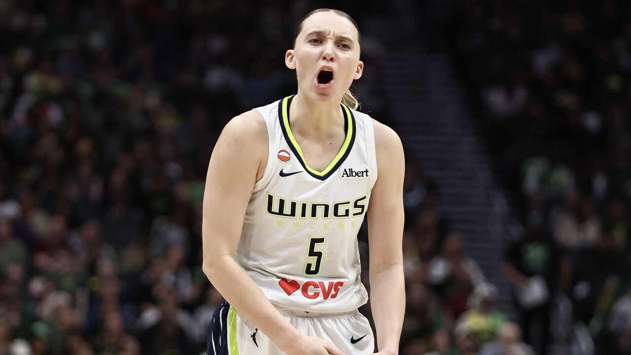 SEATTLE, WASHINGTON - SEPTEMBER 23: Paige Bueckers #5 of the Dallas Wings reacts against the Seattle Storm during the second half at Climate Pledge Arena on September 23, 2026 in Seattle, Washington.