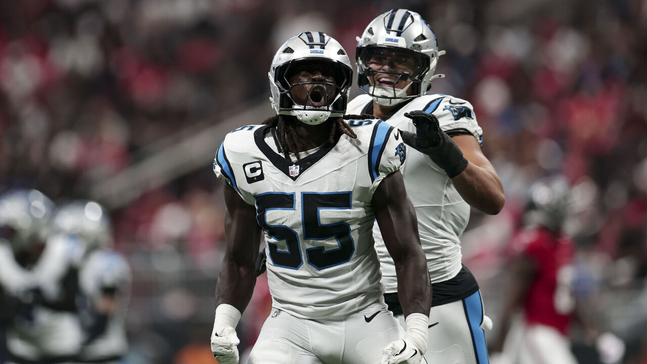 ATLANTA, GEORGIA - SEPTEMBER 20: Devin Lloyd #55 and Jean Phillips #5 of the Carolina Panthers react to a sack during an NFL football game against the Atlanta Falcons at Mercedes-Benz Stadium on September 20, 2026 in Atlanta, Georgia.