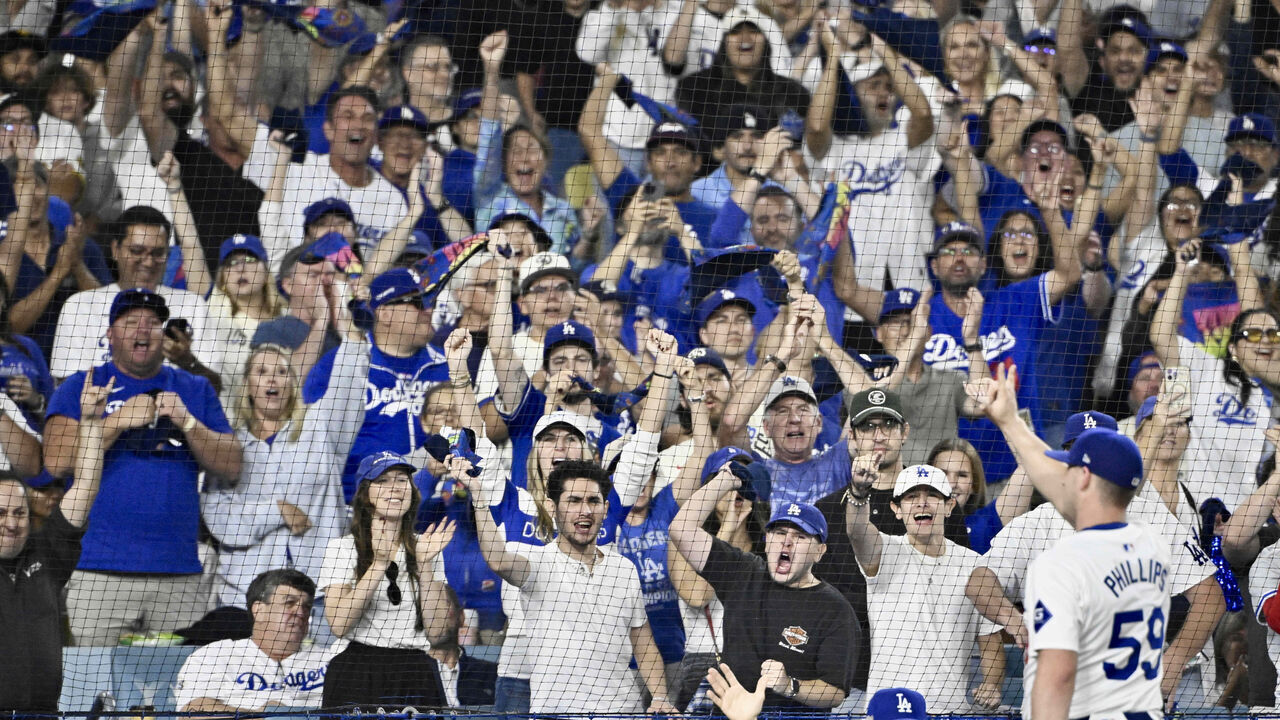 Los Angeles, CA - October 11: Relief pitcher Evan Phillips of the Los Angeles Dodgers acknowledges the crowd after being pulled against the San Diego Padres in the seventh inning of game 5 of a National League Division Series playoff baseball game at Dodger Stadium on Friday, October 11, 2024.