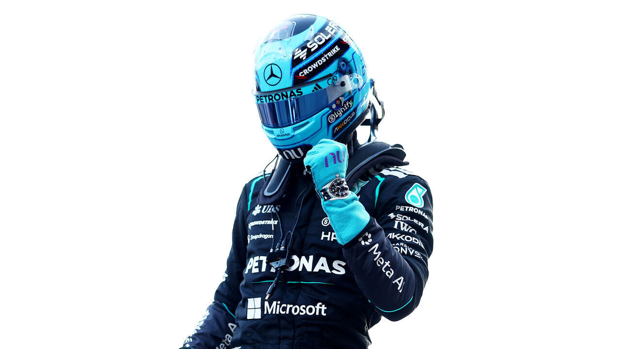 BAKU, AZERBAIJAN - SEPTEMBER 25: Pole position qualifier George Russell of Great Britain and Mercedes AMG Petronas F1 Team celebrates on arrival in parc ferme during qualifying ahead of the F1 Grand Prix of Azerbaijan at Baku City Circuit on September 25, 2026 in Baku, Azerbaijan.