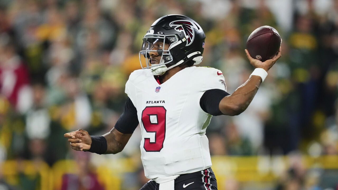 GREEN BAY, WI - SEPTEMBER 24: Michael Penix Jr. #9 of the Atlanta Falcons drops back to pass against the Green Bay Packers during an NFL football game at Lambeau Field on September 24, 2026 in Green Bay, Wisconsin.