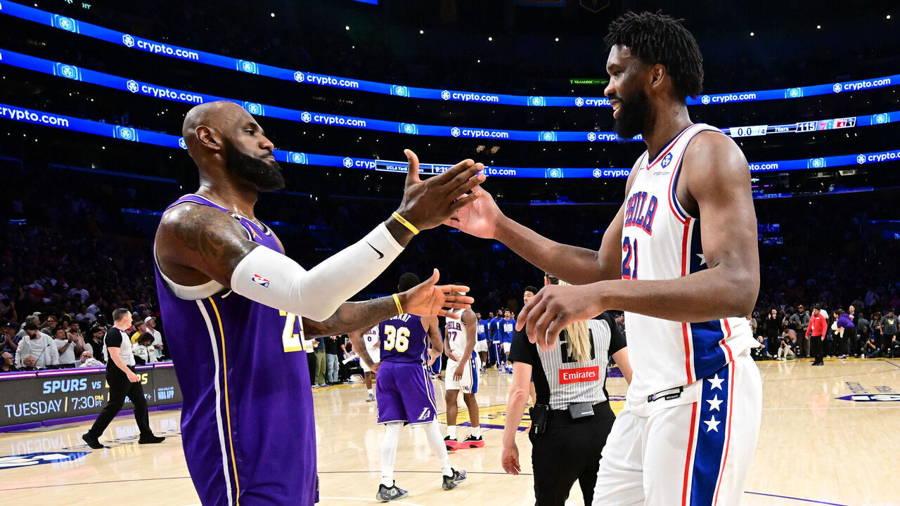 LOS ANGELES, CA - FEBRUARY 5: LeBron James #23 of the Los Angeles Lakers and Joel Embiid #21 of the Philadelphia 76ers handshake after the game on February 5, 2026 at Crypto.Com Arena in Los Angeles, California. NOTE TO USER: User expressly acknowledges and agrees that, by downloading and/or using this Photograph, user is consenting to the terms and conditions of the Getty Images License Agreement. Mandatory Copyright Notice: Copyright 2026 NBAE