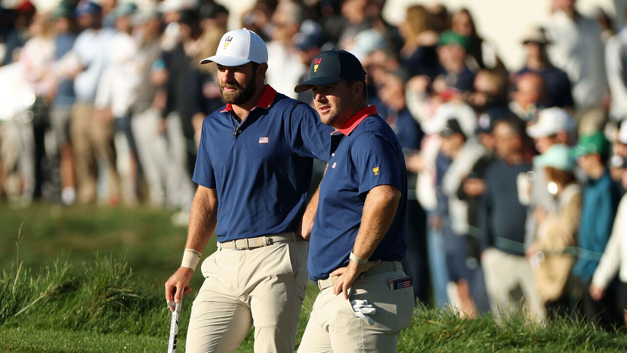 MEDINAH, ILLINOIS - SEPTEMBER 26: Cameron Young and Chris Gotterup of the U.S. Team look on from the fourth green during Saturday's Four-ball matches on day three of the Presidents Cup 2026 at Medinah Country Club on September 26, 2026 in Medinah, Illinois.