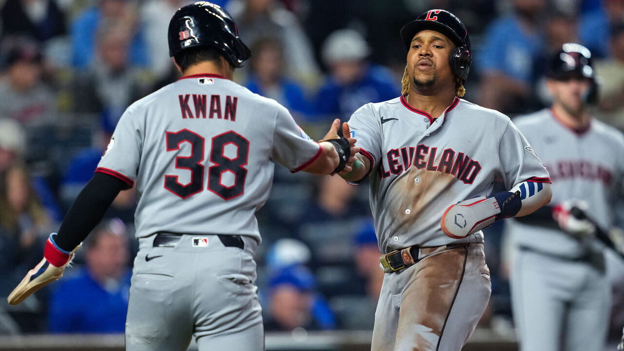 KANSAS CITY, MISSOURI - SEPTEMBER 25: Jose Ramirez #11 of the Cleveland Guardians celebrates with Steven Kwan #38 after scoring during the first inning against the Kansas City Royals at Kauffman Stadium on September 25, 2026 in Kansas City, Missouri.