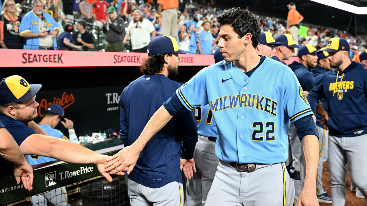 BALTIMORE, MARYLAND - SEPTEMBER 20: Christian Yelich #22 of the Milwaukee Brewers celebrates with teammates after a 3-0 victory against the Baltimore Orioles at Oriole Park at Camden Yards on September 20, 2026 in Baltimore, Maryland.