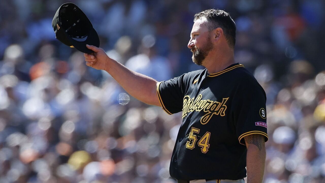 DETROIT, MI - SEPTEMBER 26: Kirby Yates #54 of the Pittsburgh Pirates acknowledges his teammates and the fans as he leaves the game in the second inning of a game against the Detroit Tigers at Comerica Park on September 26, 2026 in Detroit, Michigan.