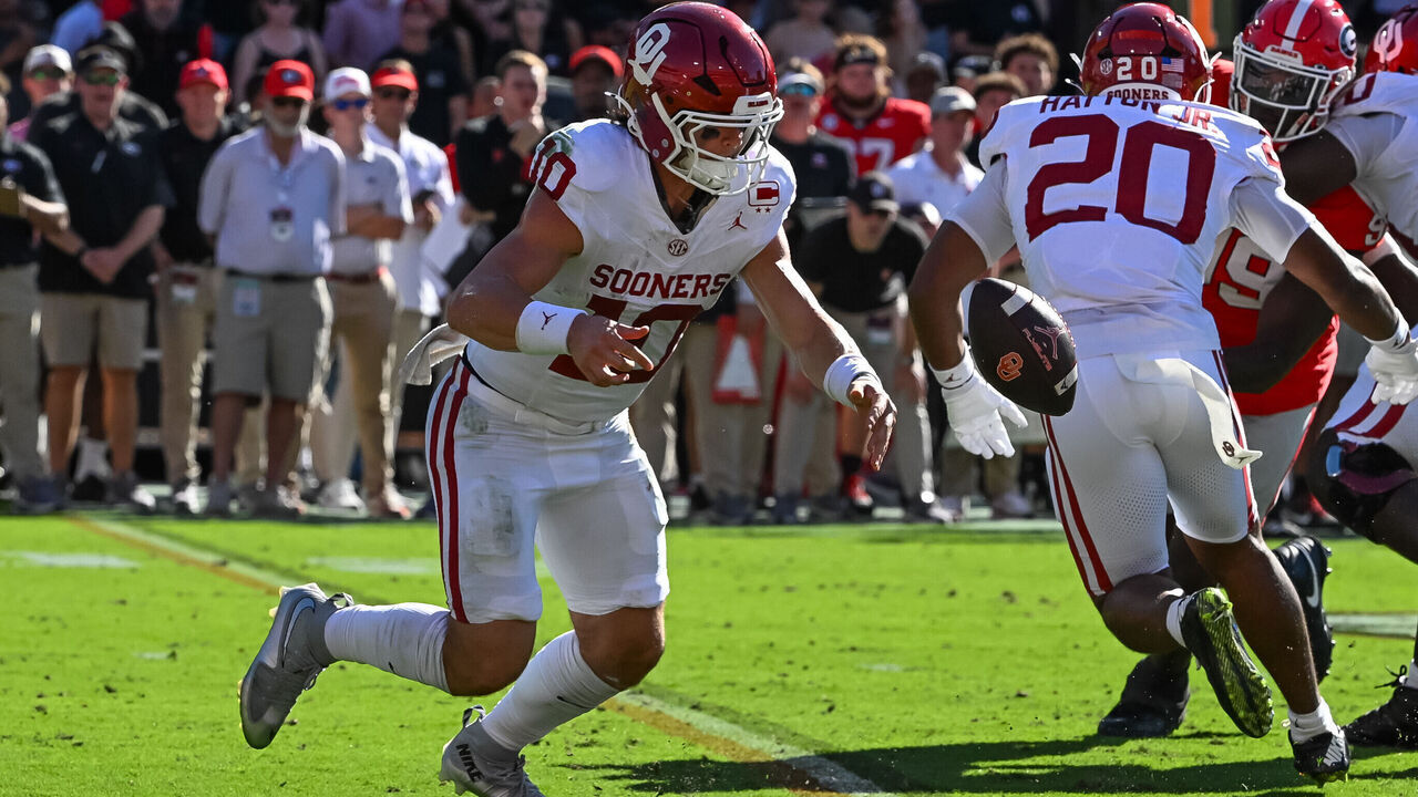 ATHENS, GA - SEPTEMBER 26: Oklahoma Sooners quarterback John Mateer(10) recovers his fumble during the college football game between the Oklahoma Sooners and Georgia Bulldogs on September 26, 2026, at Sanford Stadium in Athens, GA.