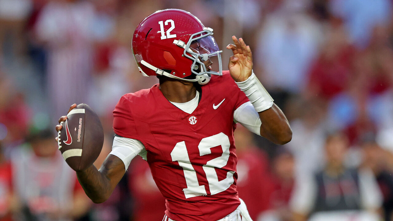 TUSCALOOSA, ALABAMA - SEPTEMBER 26: Keelon Russell #12 of the Alabama Crimson Tide throws a pass for a touchdown during the first quarter of the game against the South Carolina Gamecocks at Bryant-Denny Stadium on September 26, 2026 in Tuscaloosa, Alabama.