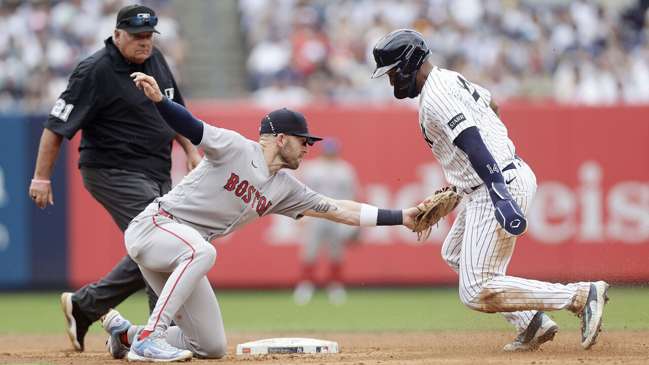 NEW YORK, NEW YORK - AUGUST 30: (NEW YORK DAILIES OUT) Trevor Story #10 of the Boston Red Sox in action against Amed Rosario #14 of the New York Yankees at Yankee Stadium on August 30, 2026 in New York City.