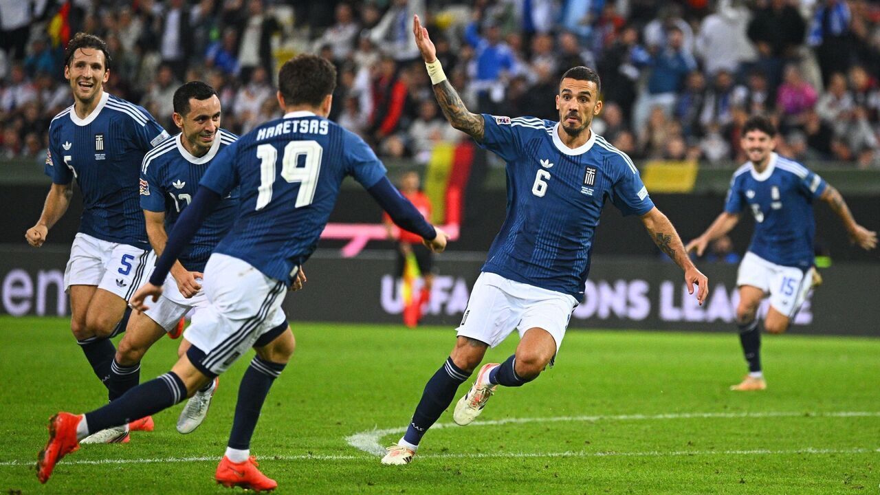 27 September 2026, Bavaria, Augsburg: Soccer, Men, Nations League A, Germany vs. Greece, Group 2, Matchday 2, WWK Arena, Dimitrios Kourbelis (Greece) celebrates after scoring the goal that made it 01. Photo: Tom Weller/dpa - IMPORTANT NOTICE: In accordance with the regulations of the Bundesliga and the DFB (German Football Association), it is prohibited to use or allow the use of photographs taken in the stadium and/or during the game in the form of sequential images and/or video-like photo series.