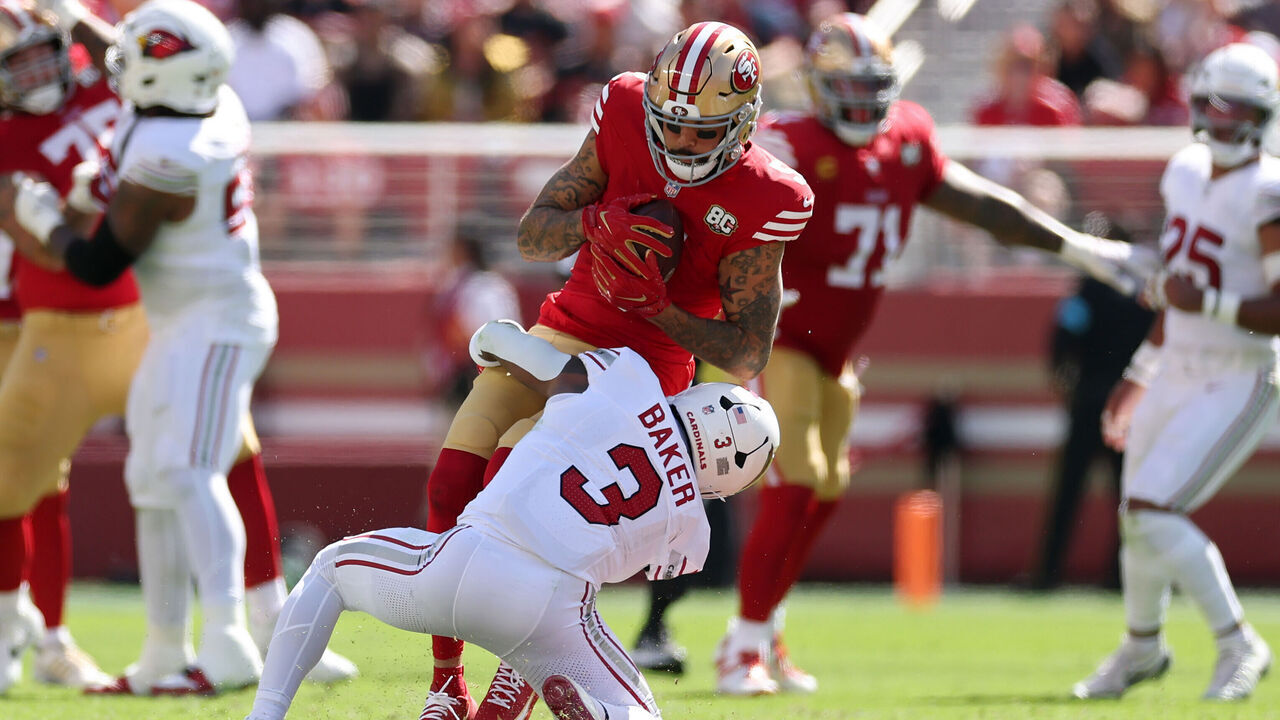 SANTA CLARA, CALIFORNIA - SEPTEMBER 27: Mike Evans #5 of the San Francisco 49ers is tackled by Budda Baker #3 of the Arizona Cardinals during the second quarter at Levi's Stadium on September 27, 2026 in Santa Clara, California.