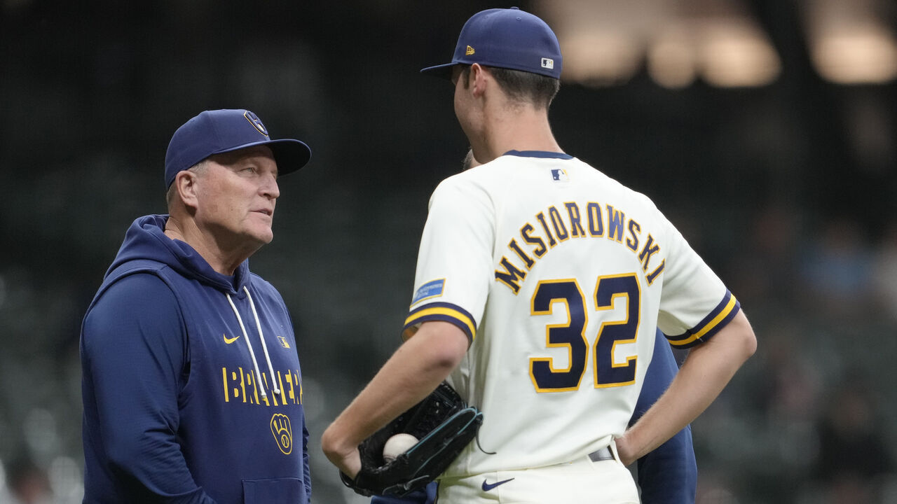 MILWAUKEE, WISCONSIN - MAY 13: Manager Pat Murphy #49 of the Milwaukee Brewers talks with Jacob Misiorowski #32 before the start of the eighth inning against the San Diego Padres at American Family Field on May 13, 2026 in Milwaukee, Wisconsin.