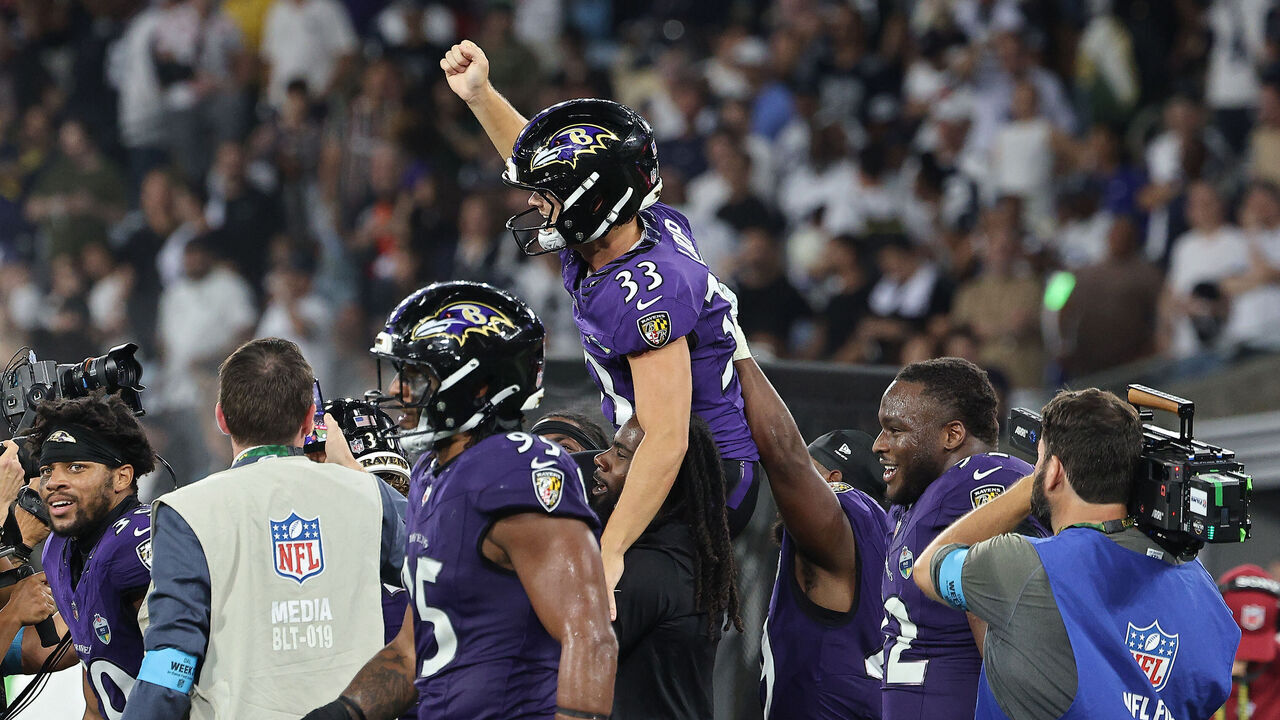 RIO DE JANEIRO, BRAZIL - SEPTEMBER 27: Tyler Loop #33 of the Baltimore Ravens celebrates with teammates after defeating the Dallas Cowboys at Maracana Stadium on September 27, 2026 in Rio de Janeiro, Brazil.