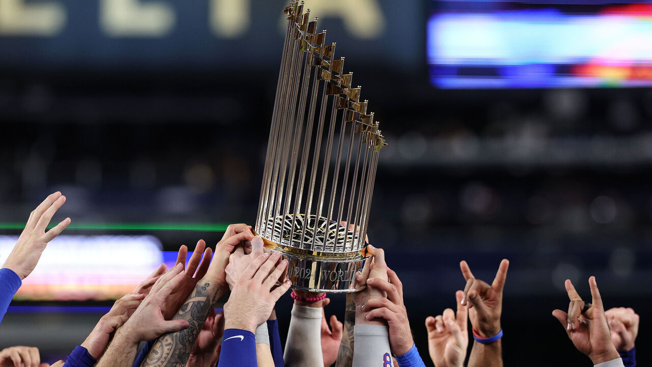NEW YORK, NEW YORK - OCTOBER 30: The Los Angeles Dodgers celebrate with the trophy after defeating the New York Yankees 7-6 in game 5 to win the 2024 World Series at Yankee Stadium on October 30, 2024 in the Bronx borough of New York City.