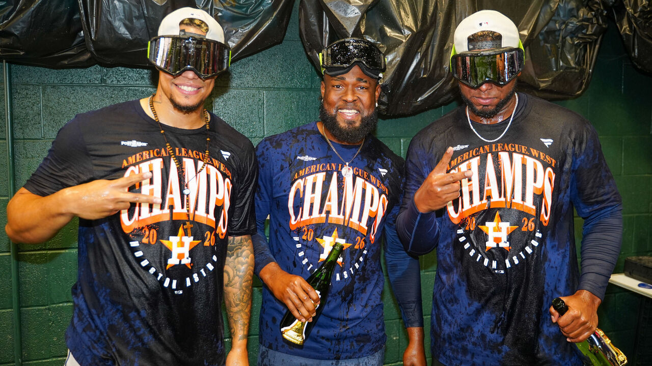 SACRAMENTO, CA - SEPTEMBER 27: Bryan Abreu #52, Cristian Javier #53, and Ronel Blanco #56 of the Houston Astros pose for a photo in the clubhouse after clinching the American League West title by defeating the Athletics at Sutter Health Park on Sunday, September 27, 2026 in Sacramento, California.