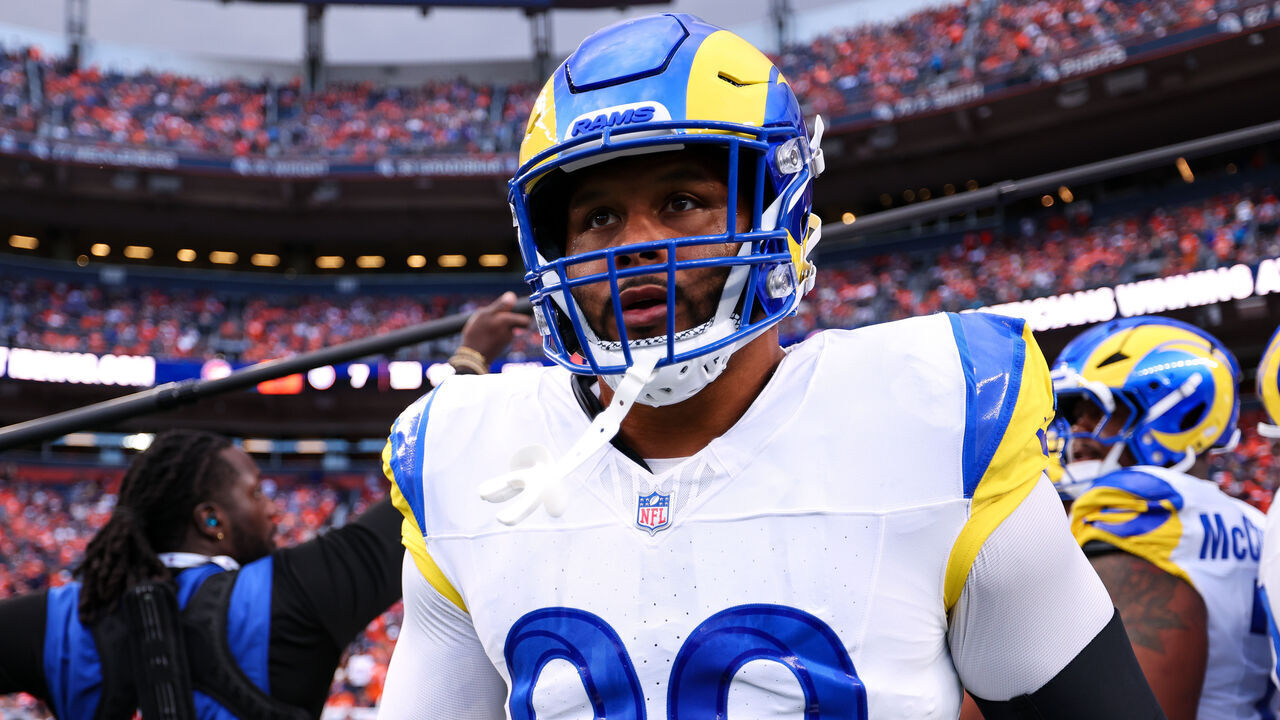 DENVER, COLORADO - SEPTEMBER 27: Aaron Donald #99 of the Los Angeles Rams walks the field prior to the game against the Denver Broncos at Empower Field at Mile High on September 27, 2026 in Denver, Colorado.