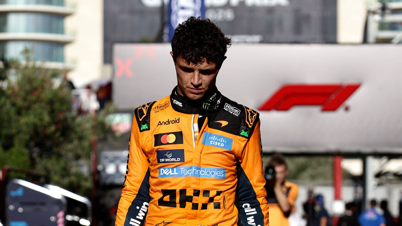 BAKU, AZERBAIJAN - SEPTEMBER 26: Lando Norris of Great Britain and McLaren looks dejected as he returns to the paddock following his crash at the safety car restart during the F1 Grand Prix of Azerbaijan at Baku City Circuit on September 26, 2026 in Baku, Azerbaijan.