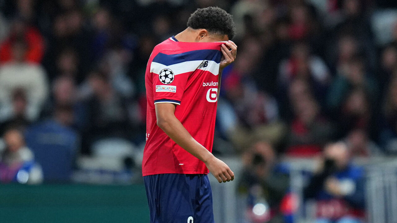 LILLE, FRANCE - SEPTEMBER 08: Ethan Mbappe of LOSC Lille looks dejected as he leaves the pitch after being shown a red card during the UEFA Champions League 2026/27 League Phase MD1 match between LOSC Lille and Real Betis Balompie at Stade Pierre Mauroy on September 08, 2026 in Lille, France.