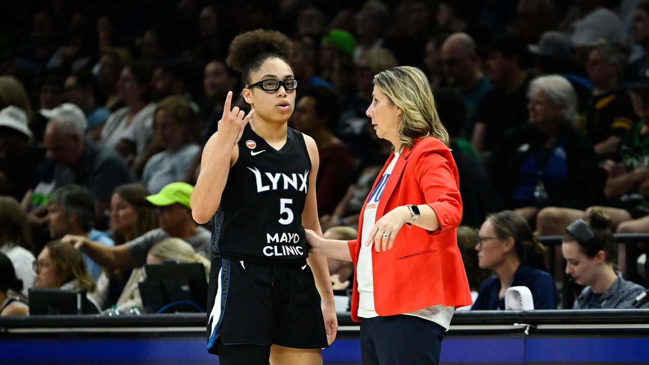 MINNEAPOLIS, MINNESOTA - JULY 28: Olivia Miles #5 of the Minnesota Lynx speaks with head coach Cheryl Reeve during the fourth quarter of the game against the Toronto Tempo at Target Center on July 28, 2026 in Minneapolis, Minnesota.