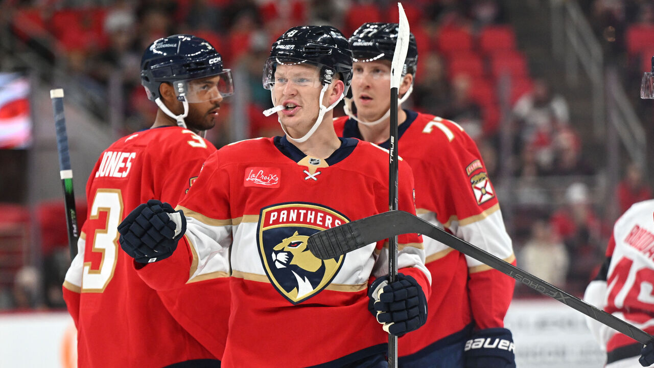RALEIGH, NC - SEPTEMBER 22: Forward Brady Tkachuk (8) of the Florida Panthers celebrates with teammates after scoring during the preseason NHL game between the Florida Panthers and the Carolina Hurricanes on September 22, 2026 at Lenovo Center in Raleigh, North Carolina.