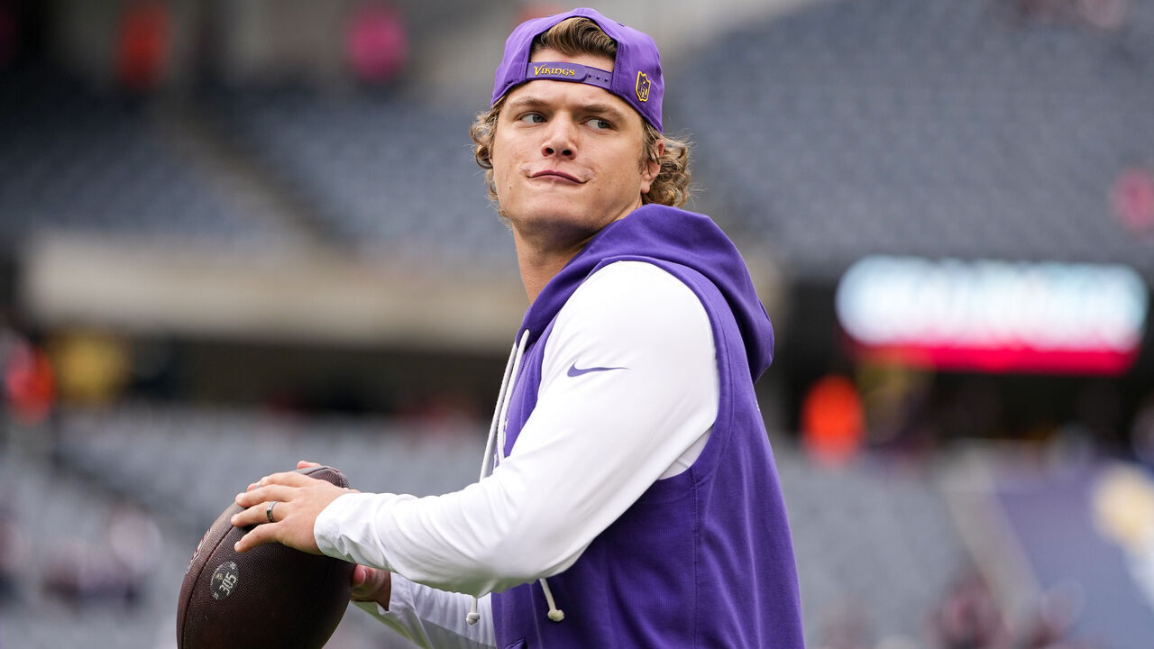 CHICAGO, ILLINOIS - SEPTEMBER 20: J.J. McCarthy #9 of the Minnesota Vikings warms up prior to the game against the Chicago Bears at Soldier Field on September 20, 2026 in Chicago, Illinois.