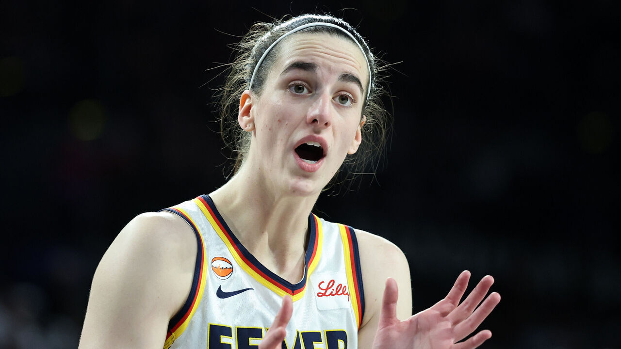 LAS VEGAS, NEVADA - SEPTEMBER 27: Caitlin Clark #22 of the Indiana Fever talks to a referee during a stop in play in the second quarter of Game One of the 2026 WNBA Playoffs first round against the Las Vegas Aces at Michelob ULTRA Arena on September 27, 2026 in Las Vegas, Nevada. The Aces defeated the Fever 102-85.