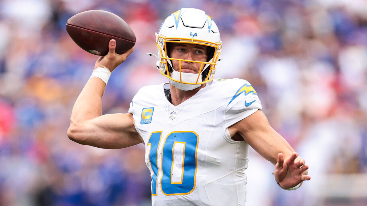 ORCHARD PARK, NEW YORK - SEPTEMBER 27: Justin Herbert #10 of the Los Angeles Chargers throws a pass during the fourth quarter of the game against the Buffalo Bills at Highmark Stadium on September 27, 2026 in Orchard Park, New York.