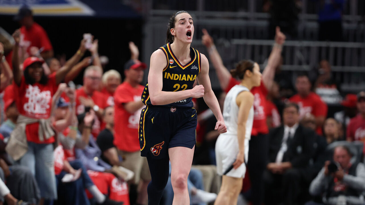 INDIANAPOLIS, INDIANA - SEPTEMBER 29: Caitlin Clark #22 of the Indiana Fever celebrates after making a shot in the 99-89 over the Las Vegas Aces during game two of the first round of the WNBA Playoffs at Gainbridge Fieldhouse on September 29, 2026 in Indianapolis, Indiana. NOTE TO USER: User expressly acknowledges and agrees that, by downloading and or using this photograph, User is consenting to the terms and conditions of the Getty Images License