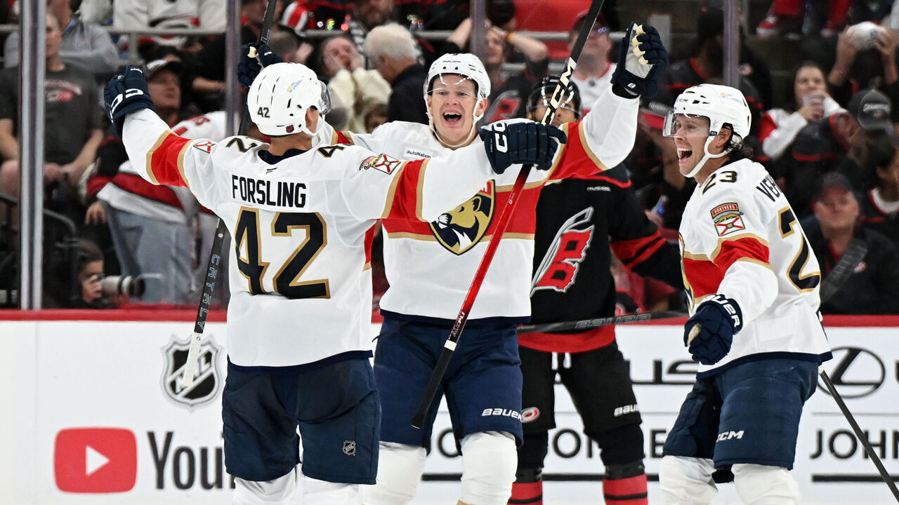 RALEIGH, NC - SEPTEMBER 29: Defenseman Gustav Forsling (42) of the Florida Panthers celebrates with Forward Brady Tkachuk (8) of the Florida Panthers and Center Carter Verhaeghe (23) of the Florida Panthers after scoring in overtime during the NHL game between the Florida Panthers and the Carolina Hurricanes on September 29, 2026 at Lenovo Center in Raleigh, North Carolina.