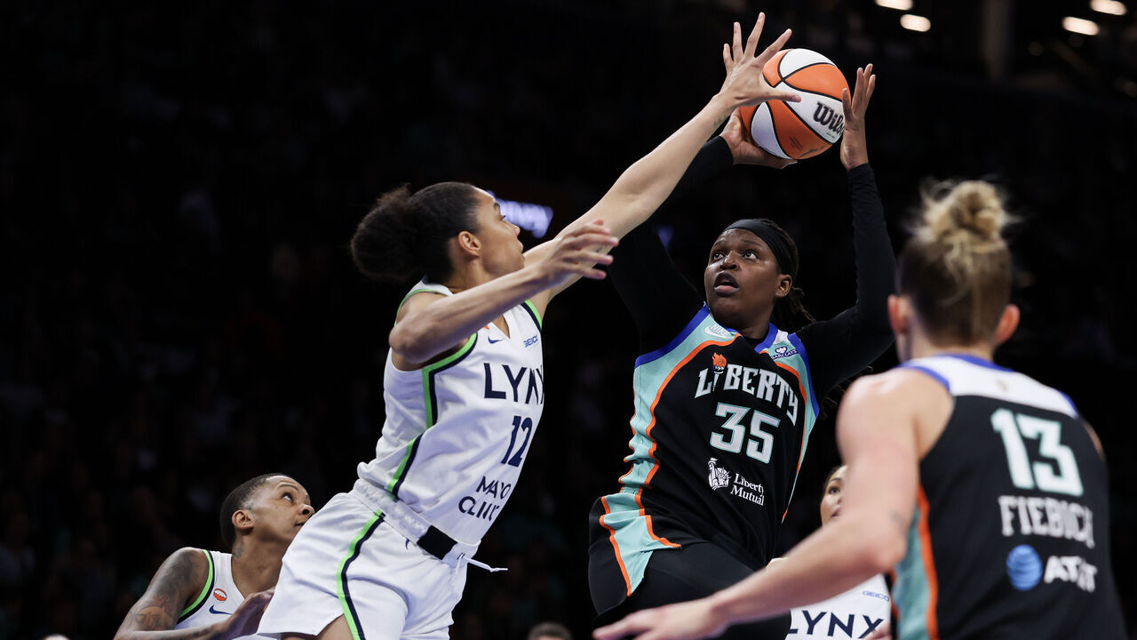 NEW YORK, NEW YORK - SEPTEMBER 29: Jonquel Jones #35 of the New York Liberty shoots the ball against Nia Brodie #12 of the Minnesota Lynx during the first quarter during game two of the WNBA Playoffs first round at Barclays Center on September 29, 2026 in the Brooklyn borough of New York City.