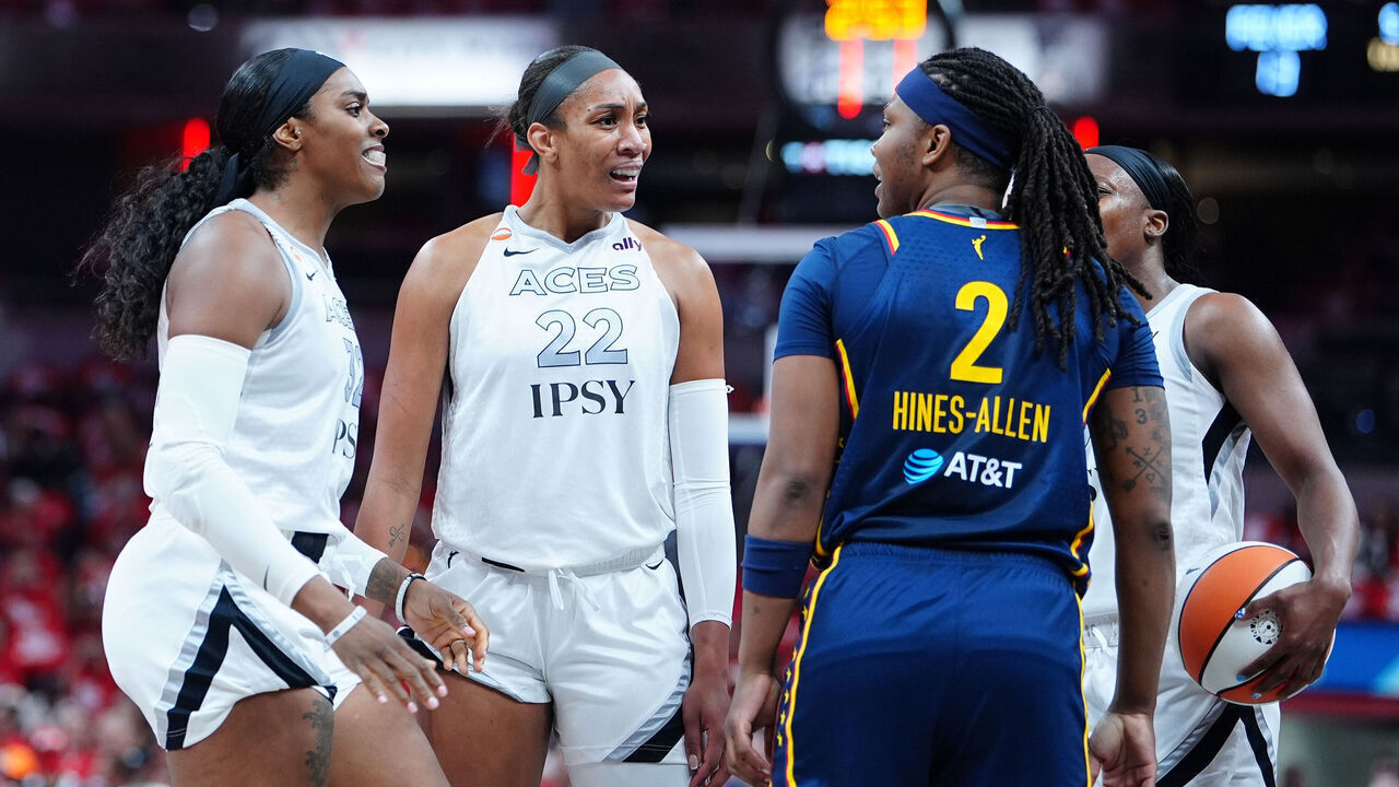INDIANAPOLIS, IN - SEPTEMBER 29: Las Vegas Aces center A'ja Wilson (22) has words with Indiana Fever forward Myisha Hines-Allen (2) in game two of Round 1 of the WNBA Playoffs on September 29, 2026, at Gainbridge Fieldhouse in Indianapolis, Indiana.