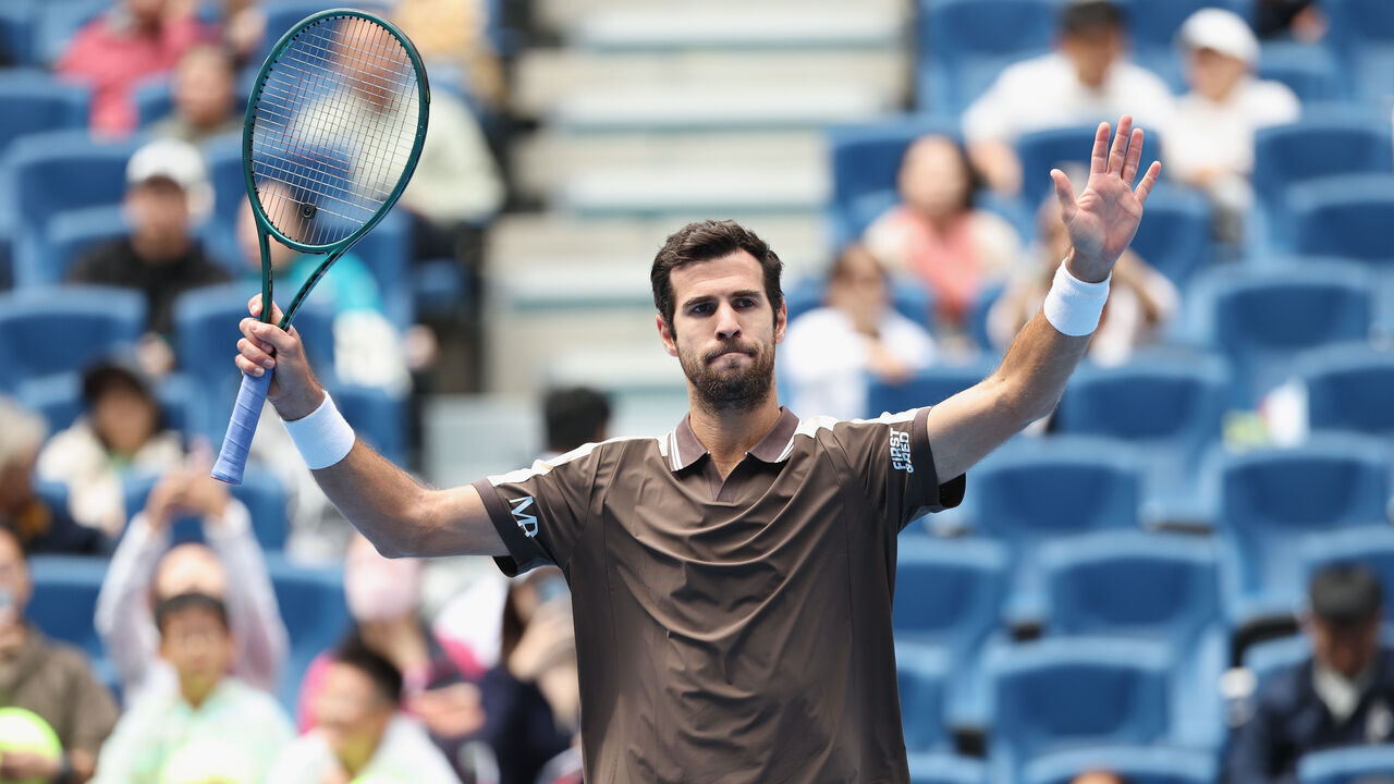 BEIJING, CHINA - SEPTEMBER 30: Karen Khachanov celebrates after winning the Men's singles first round match against Felix Auger Aliassime of Canada on day one of China Open at the National Tennis Center on September 30, 2026 in Beijing, China.