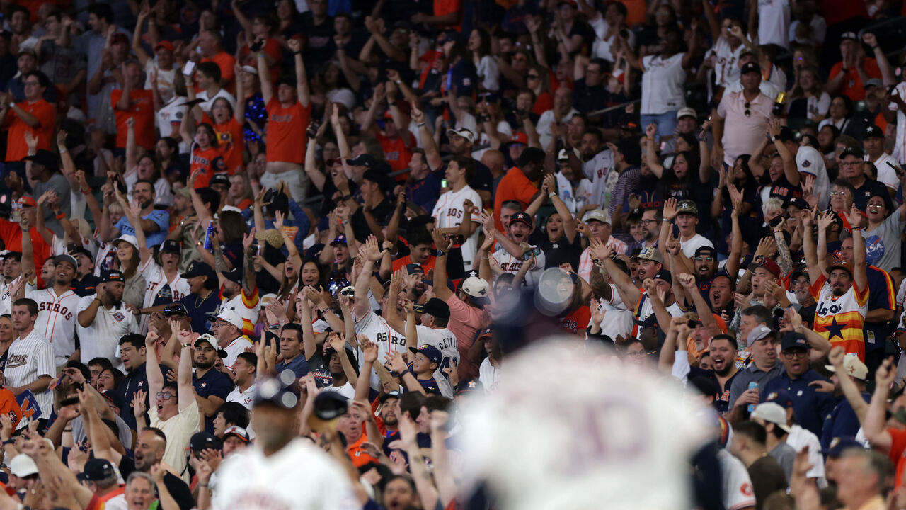 HOUSTON, TEXAS - SEPTEMBER 29: Fans celebrate after Nelson Velázquez #30 of the Houston Astros hit a home run in the fifth inning against the Chicago White Sox in game one of the American League Wild Card Series at Daikin Park on September 29, 2026 in Houston, Texas.