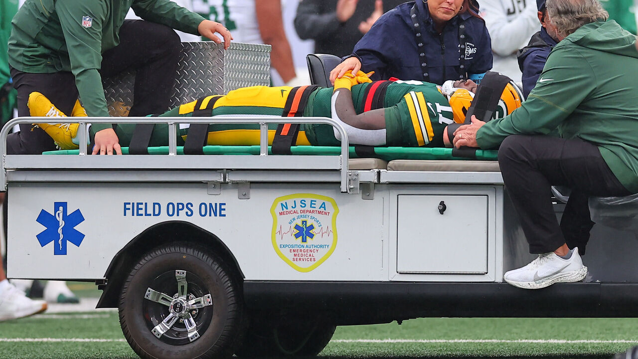 EAST RUTHERFORD, NJ - SEPTEMBER 20: Jayden Reed #11 of the Green Bay Packers is takes from the field on the medical cart during the first quarter of the game against the New York Jets on September 20, 2026 at MetLife Stadium in East Rutherford, New Jersey.