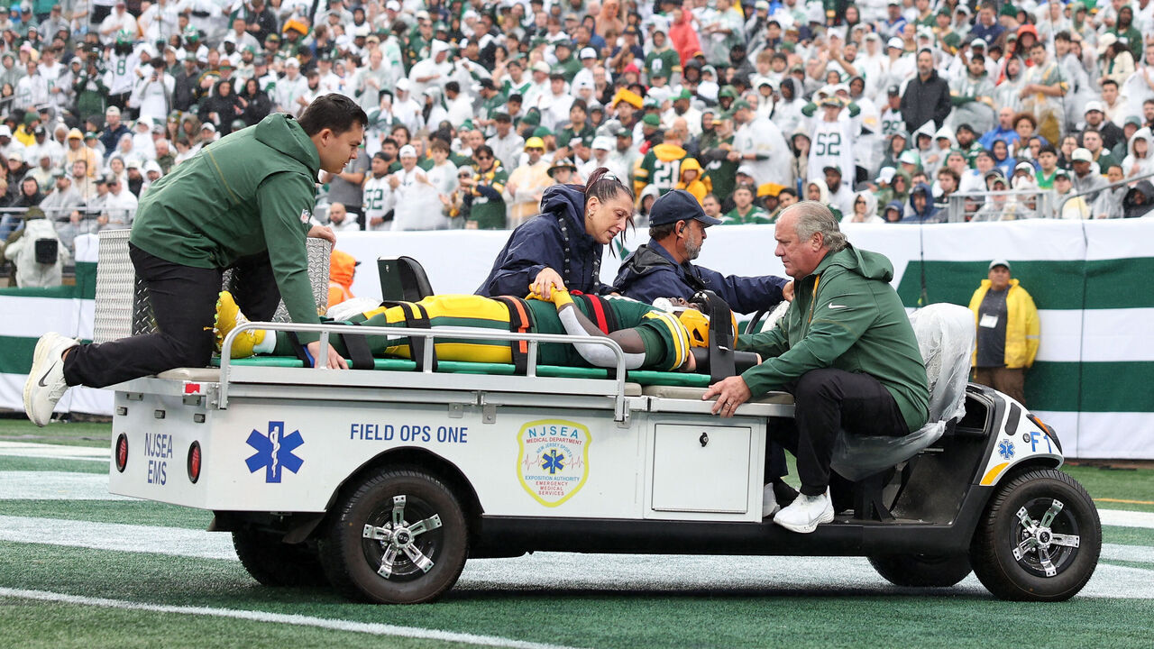 EAST RUTHERFORD, NEW JERSEY - SEPTEMBER 20: Jayden Reed #11 of the Green Bay Packers is taken off the field due to an injury against the New York Jets during the first half of the game at MetLife Stadium on September 20, 2026 in East Rutherford, New Jersey.