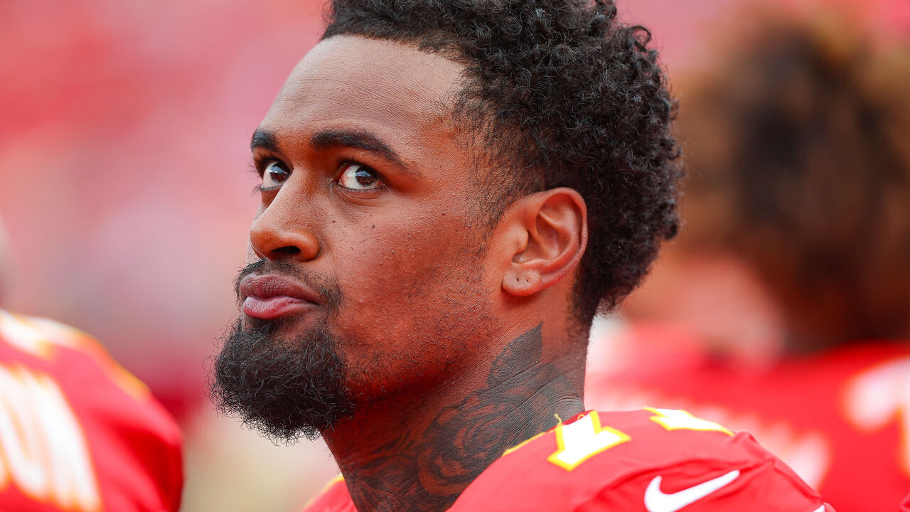 KANSAS CITY, MISSOURI - AUGUST 15: Offensive tackle Josh Simmons #71 of the Kansas City Chiefs stands on the team sidelines during the fourth quarter of NFL game action against the Los Angeles Rams at Arrowhead Stadium on August 15, 2026 in Kansas City, Missouri.