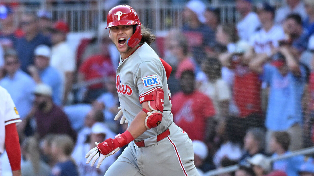 ATLANTA, GEORGIA - SEPTEMBER 30: Alec Bohm #28 of the Philadelphia Phillies runs the bases after hitting a home run against the Atlanta Braves during the tenth inning in game two of the National League Wild Card Series at Truist Park on September 30, 2026 in Atlanta, Georgia.