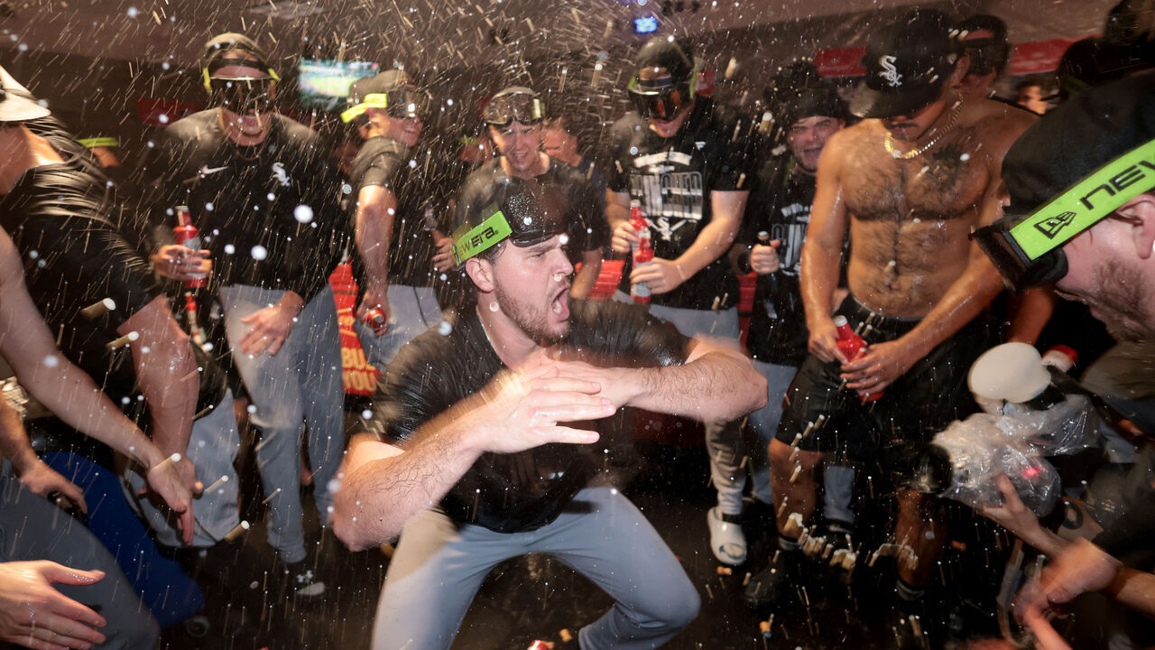 HOUSTON, TEXAS - SEPTEMBER 30: Mike Vasil #61 of Chicago White Sox celebrates in the locker room after defeating the Houston Astros in game two of the American League Wild Card Series at Daikin Park on September 30, 2026 in Houston, Texas.