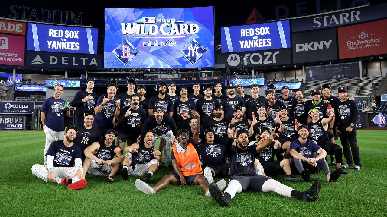 NEW YORK, NEW YORK - SEPTEMBER 30: The New York Yankees pose for a group photo in center field after defeating the Boston Red Sox in game two of the American League Wild Card Series at Yankee Stadium on September 30, 2026 in the Bronx borough of New York City.