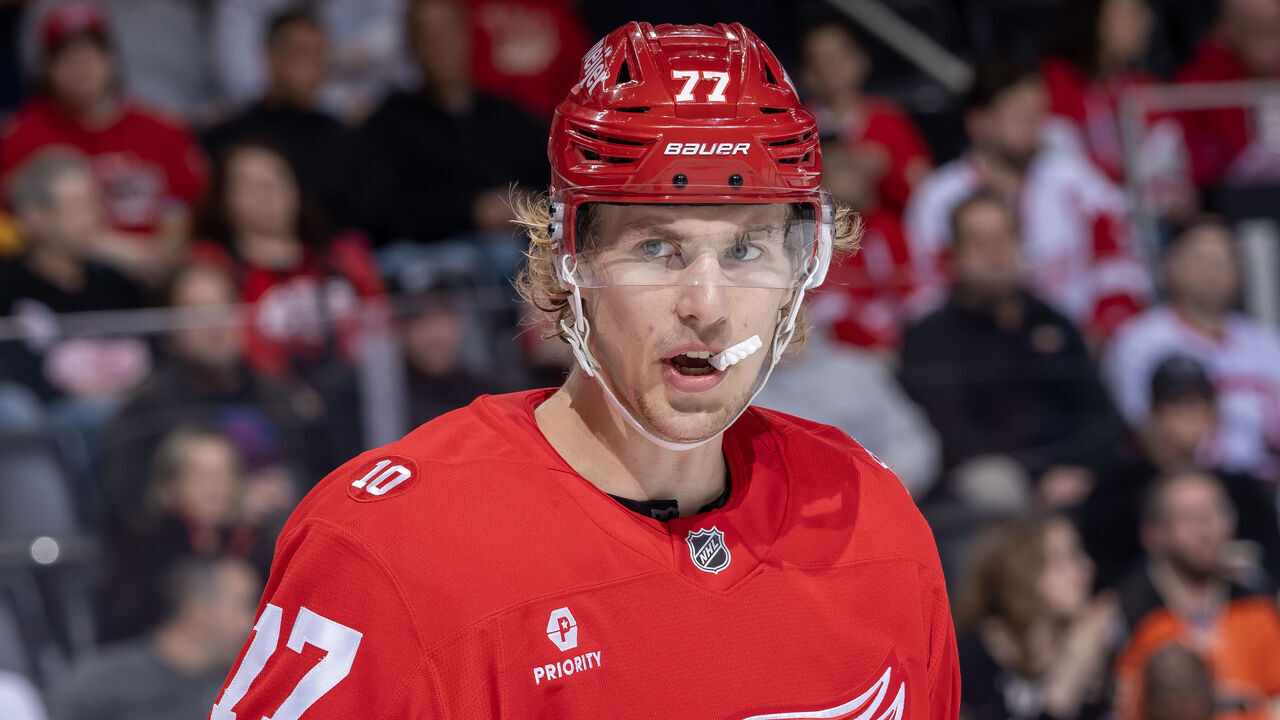 DETROIT, MICHIGAN - APRIL 09: Simon Edvinsson #77 of the Detroit Red Wings looks down the ice against the Philadelphia Flyers during the second period at Little Caesars Arena on April 9, 2026 in Detroit, Michigan.