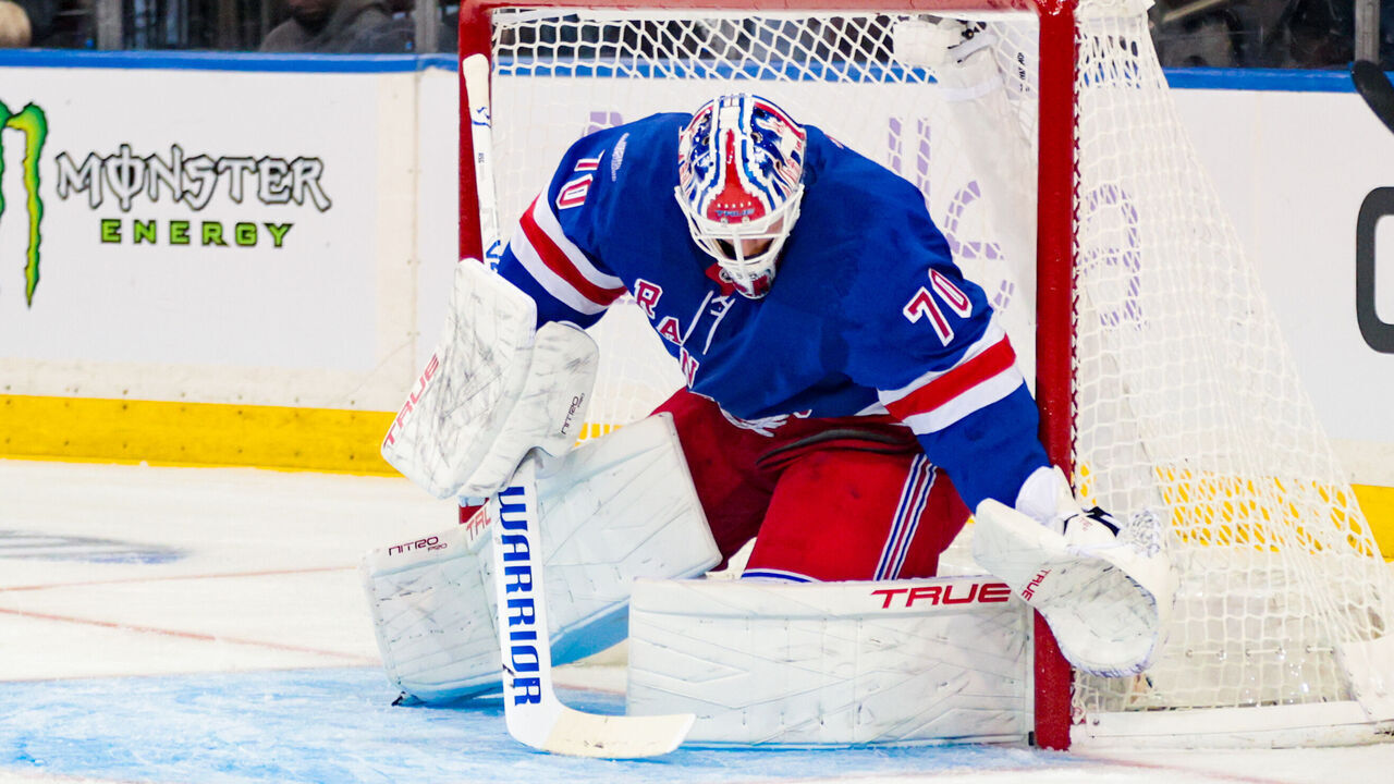 NEW YORK, NY - SEPTEMBER 24: Joonas Korpisalo #70 of the New York Rangers just barely traps a loose puck against the post during the first period of the National Hockey League Preseason game between the New Jersey Devils and the New York Rangers on September 24, 2026 at Madison Square Garden in New York, NY.